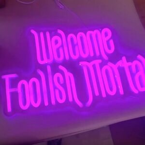 New neon Haunted mansion sign